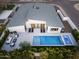 Aerial view of a luxurious home featuring a pool, spa, and modern outdoor seating area at 4002 N 33Rd Pl, Phoenix, AZ 85018