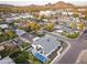 Bird's eye view of residential neighborhood with a home featuring a pool and modern design at 4002 N 33Rd Pl, Phoenix, AZ 85018