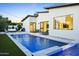 Stunning backyard with a sleek pool, patio, and lush landscaping creating a private retreat at 4002 N 33Rd Pl, Phoenix, AZ 85018