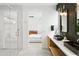 Elegant bathroom features a double vanity, shower, and access to the bedroom at 4002 N 33Rd Pl, Phoenix, AZ 85018