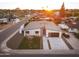 Inviting home exterior boasts modern design, desert landscaping, and a spacious driveway, ideal for curb appeal at 4002 N 33Rd Pl, Phoenix, AZ 85018