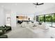 Spacious open-concept living room leading to the kitchen and outdoor pool area at 4002 N 33Rd Pl, Phoenix, AZ 85018
