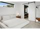 Bright main bedroom with a walk-in closet and access to the main bathroom at 4002 N 33Rd Pl, Phoenix, AZ 85018