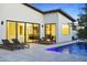 Sophisticated patio with modern design, views into the dining and living room, and a sparkling pool at 4002 N 33Rd Pl, Phoenix, AZ 85018