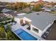 Aerial view of home with pool, patio seating, and desert mountain views, perfect for luxurious outdoor living and entertaining at 4002 N 33Rd Pl, Phoenix, AZ 85018