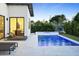 Modern pool with integrated spa and elegant patio, perfect for outdoor entertainment and relaxation at 4002 N 33Rd Pl, Phoenix, AZ 85018
