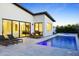 Stunning backyard pool and spa with modern lounge chairs and seamless indoor-outdoor living at 4002 N 33Rd Pl, Phoenix, AZ 85018