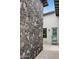 The home's exterior features a stunning stone accent wall, paired with modern design elements at 4002 N 33Rd Pl, Phoenix, AZ 85018