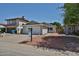 Charming single-story home featuring a two-car garage, well-maintained driveway and low maintenance landscaping at 4445 W Oraibi Dr, Glendale, AZ 85308