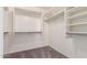 Walk-in closet featuring built-in shelving and organizational features at 44859 W Sage Brush Dr, Maricopa, AZ 85139