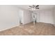 Spacious bedroom with ceiling fan and tile flooring at 4611 N 79Th Dr, Phoenix, AZ 85033