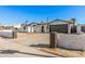 Attractive single-story home with a concrete driveway and a decorative brick wall at 4611 N 79Th Dr, Phoenix, AZ 85033