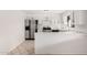 Bright kitchen featuring stainless steel appliances, white cabinets, and granite countertops at 4611 N 79Th Dr, Phoenix, AZ 85033