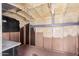 View of unfinished interior of storage shed with insulation and wood framing at 4611 N 79Th Dr, Phoenix, AZ 85033