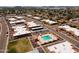 Community aerial view showcasing numerous homes and refreshing community pool at 501 W Tonopah Dr # 7, Phoenix, AZ 85027