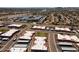 Aerial view showcases the community layout, landscaping, and nearby highway access at 501 W Tonopah Dr # 7, Phoenix, AZ 85027