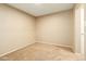 Cozy bedroom features neutral walls and carpet, offering a blank canvas at 501 W Tonopah Dr # 7, Phoenix, AZ 85027