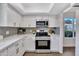 Well-appointed kitchen featuring modern appliances, stylish cabinetry, and contemporary finishes at 5025 W New World Dr, Glendale, AZ 85302