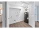 Utility room features a new water heater, wood-look floors, and a utility sink at 5025 W New World Dr, Glendale, AZ 85302