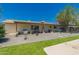 Relaxing backyard featuring desert landscaping, covered patio, and an inviting outdoor space at 5031 W Grandview Rd, Glendale, AZ 85306