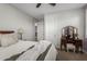 Cozy bedroom featuring a decorative vanity, soft lighting, and tranquil atmosphere at 6235 S Odessa Dr, Gilbert, AZ 85298