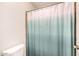 Bathroom with shower curtain and toilet at 6808 W Angela Dr, Glendale, AZ 85308