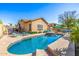 Private pool surrounded by mature trees, providing a tranquil outdoor oasis at 6808 W Angela Dr, Glendale, AZ 85308