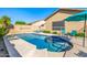 Inviting in-ground pool with a spacious sundeck perfect for outdoor relaxation at 6808 W Angela Dr, Glendale, AZ 85308