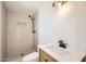 Elegant bathroom featuring a sleek vanity with quartz countertop and new walk-in shower at 726 N 78Th St, Scottsdale, AZ 85257