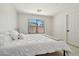 Bright bedroom featuring a bed with a large window providing ample natural light at 7500 E Deer Valley Rd # 132, Scottsdale, AZ 85255