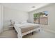 Cozy bedroom featuring a bed with a large window providing ample natural light at 7500 E Deer Valley Rd # 132, Scottsdale, AZ 85255