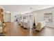 Open-concept living area with wood floors and neutral tones perfect for entertaining at 7500 E Deer Valley Rd # 132, Scottsdale, AZ 85255