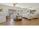 Bright living room boasts wood floors, modern decor, and plenty of natural light at 7500 E Deer Valley Rd # 132, Scottsdale, AZ 85255
