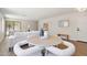 Cozy seating arrangement in a stylish living room with bright, natural light at 7500 E Deer Valley Rd # 132, Scottsdale, AZ 85255
