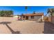 Spacious backyard with patio, block fence, and low-maintenance landscaping at 815 W El Prado Rd, Chandler, AZ 85225