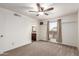 Bedroom with carpet, ceiling fan, and a window at 815 W El Prado Rd, Chandler, AZ 85225