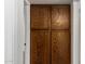 Hallway view of a large, wooden linen closet at 815 W El Prado Rd, Chandler, AZ 85225