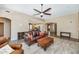 Large living room with tile floors, high ceilings, and an open floor plan at 8210 W Wethersfield Rd, Peoria, AZ 85381