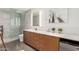 Spa like bathroom with a large vanity, a modern walk-in shower, and contemporary finishes at 9502 N 47Th St, Phoenix, AZ 85028