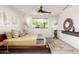 Inviting bedroom with a warm color palette, stylish rug, and ample natural light at 9502 N 47Th St, Phoenix, AZ 85028