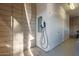 Well-organized garage with ample storage space, an electrical panel, and an EV charging station at 9502 N 47Th St, Phoenix, AZ 85028