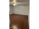 Clean, empty bedroom with a ceiling fan, a smooth ceiling, and hardwood floors at 973 Leisure World --, Mesa, AZ 85206