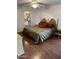 Comfortable main bedroom featuring a large bed and an organized walk-in closet at 973 Leisure World --, Mesa, AZ 85206