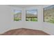 Bright bedroom featuring neutral carpet and a tranquil view at 9820 N Central Ave # 303, Phoenix, AZ 85020