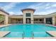 Relaxing community pool with ample seating and shaded lounging areas at 9820 N Central Ave # 303, Phoenix, AZ 85020