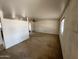 Spacious living room featuring an open layout, ceiling fan, and abundant natural light at 10728 W El Rancho Dr, Sun City, AZ 85351