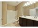 Well-lit bathroom featuring a double sink vanity and shower-tub combo at 1367 S Country Club Dr # 1167, Mesa, AZ 85210