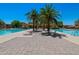 Relaxing community pool offering a place to unwind with lounge chairs, desert landscaping and comfortable sitting areas at 1367 S Country Club Dr # 1167, Mesa, AZ 85210