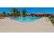 Inviting community pool surrounded by lush landscaping, providing a refreshing and scenic outdoor space for residents at 1367 S Country Club Dr # 1167, Mesa, AZ 85210