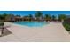 Stunning pool with ample deck space, palm trees, and seating for relaxing and enjoying the outdoor amenities at 1367 S Country Club Dr # 1167, Mesa, AZ 85210